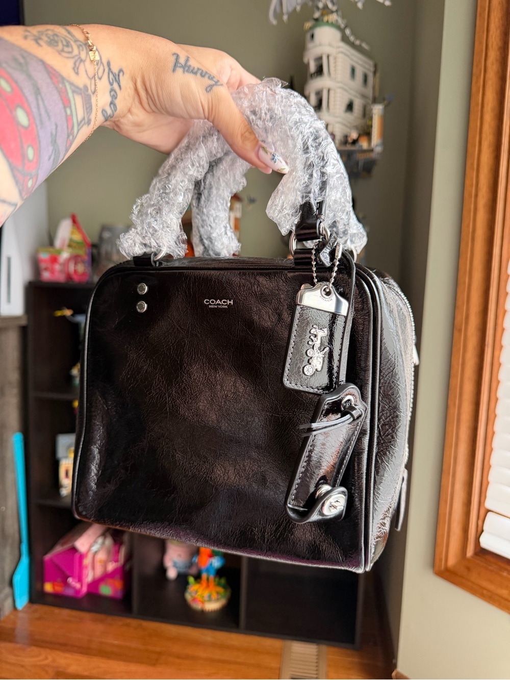 Coach black glazed cube rogue 20